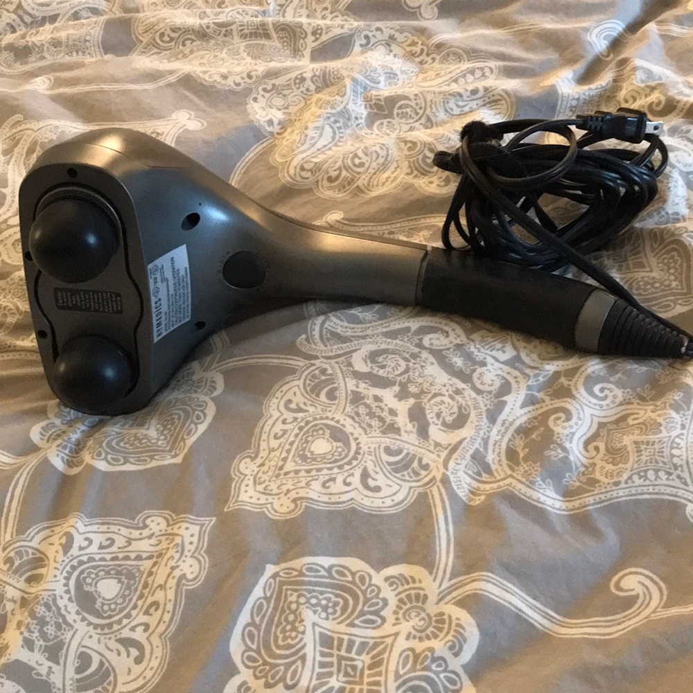 New never used Homedics hand held massager.
